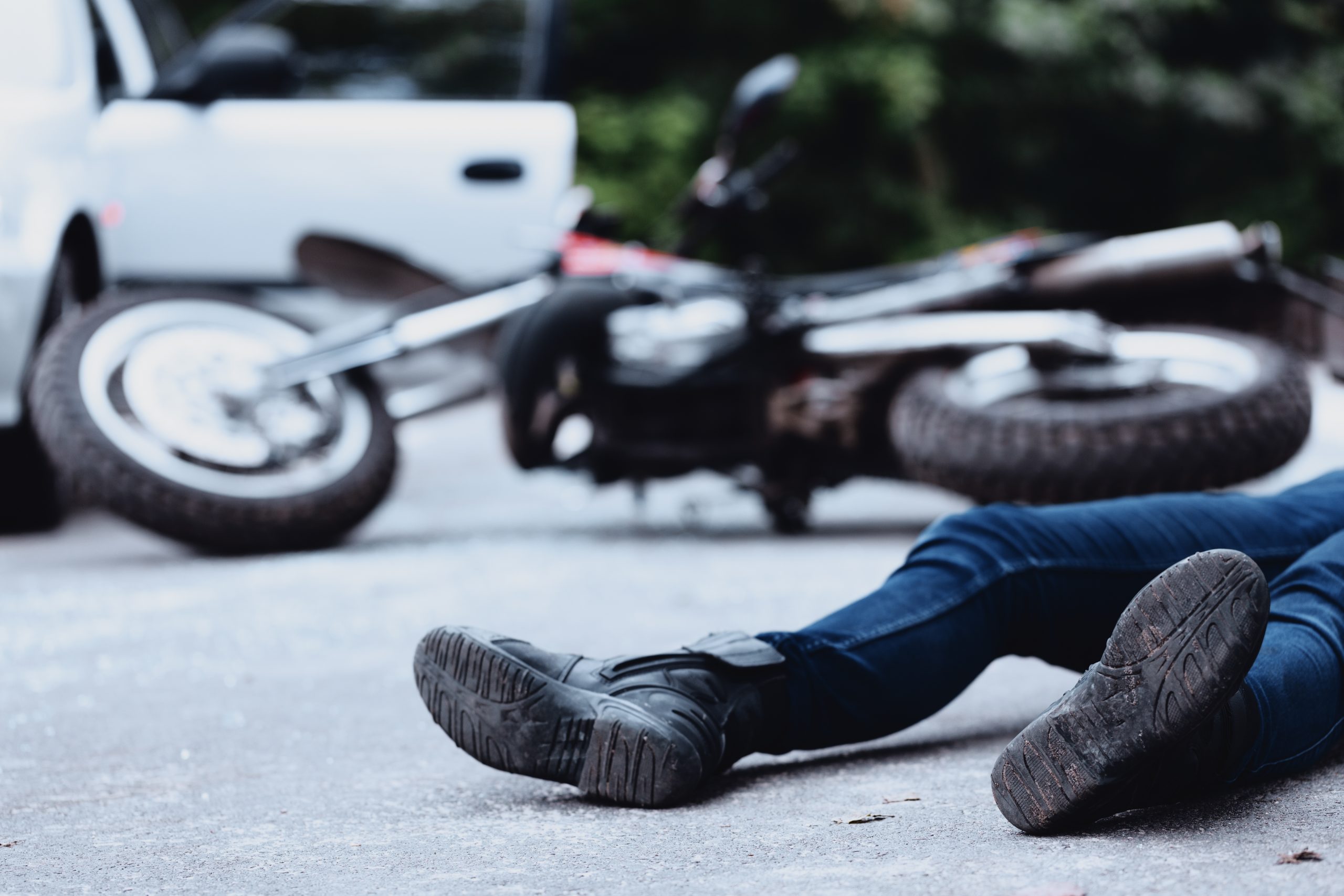 Motorcycle accident victim injured in the middle of the street