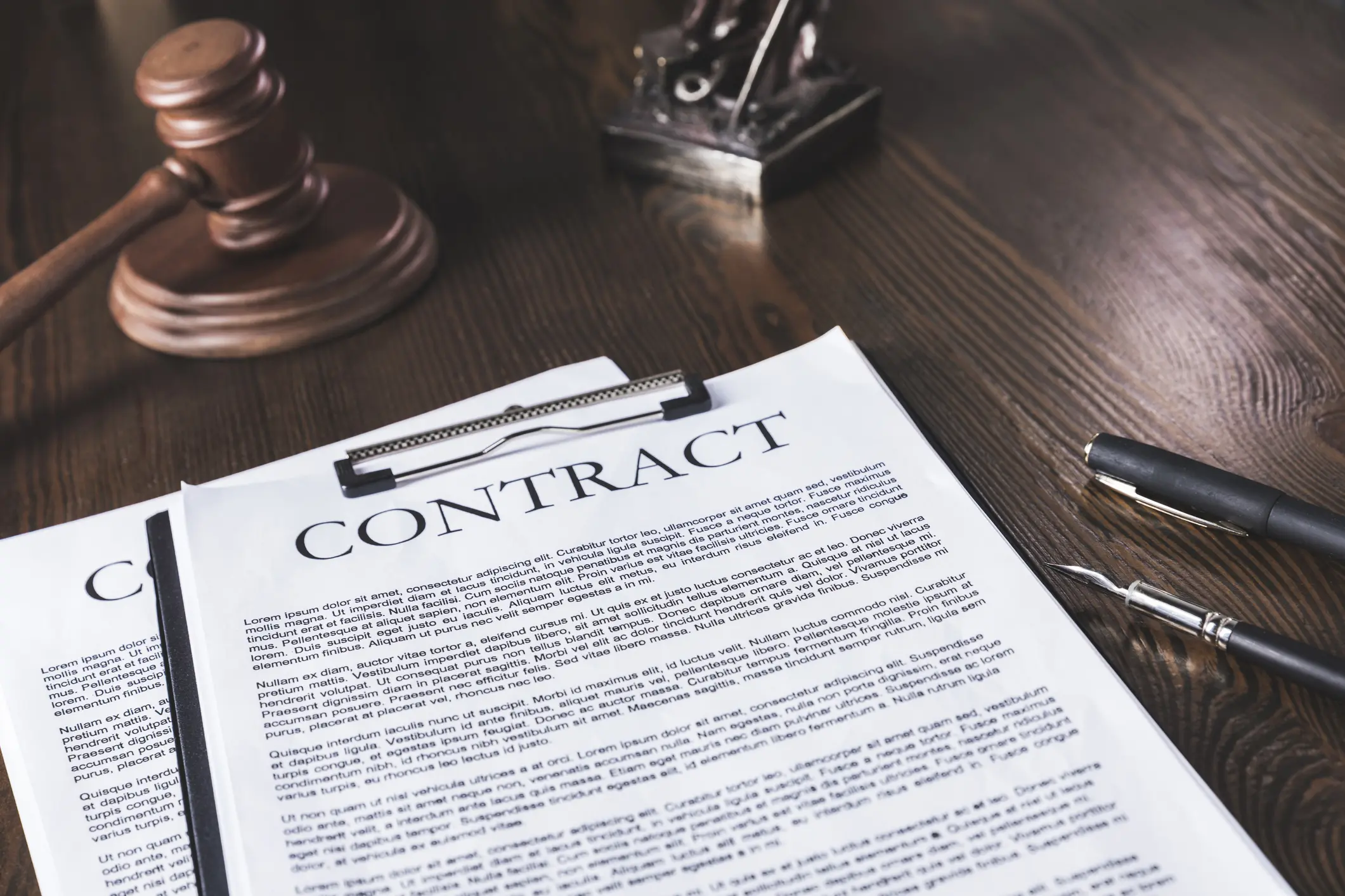 contracts sitting on a desk